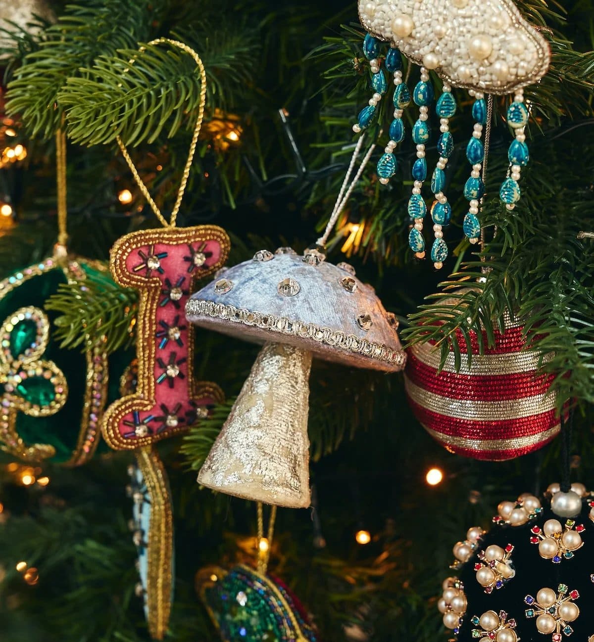 Beaded Christmas ornaments from anna + nina: a mushroom, a letter and a striped bauble